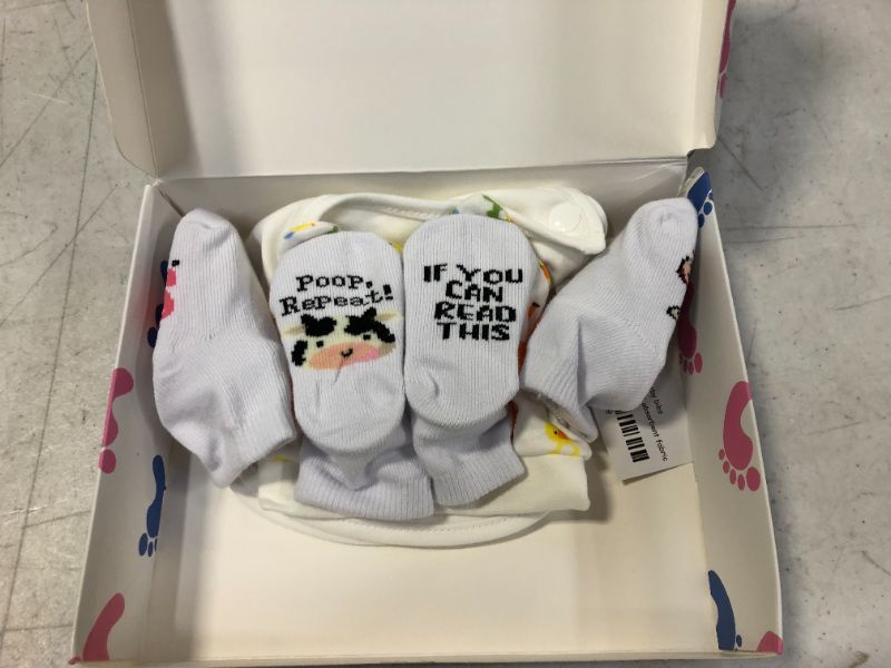 Photo 1 of Baby Gift Set for Baby Boys & Girls – Newborn Baby Socks, Baby Bibs, & Baby Hat – Cute and Funny Baby Shower Gifts, Baby Items, Unisex Newborn Baby Clothes, Baby Registry Search
