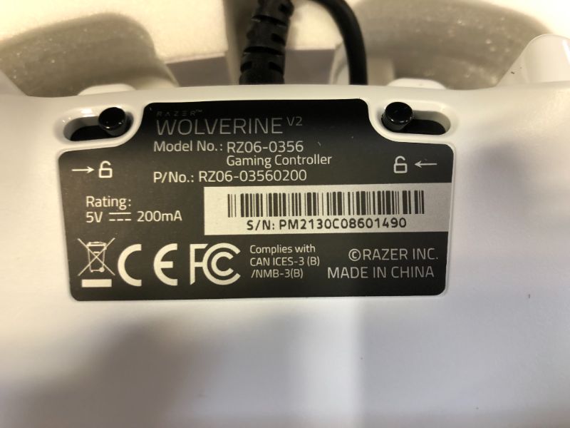 Photo 1 of Razer Wolverine V2 Wired Gaming Controller for Xbox Series X|S, Xbox One, PC: Remappable Front-Facing Buttons - Mecha-Tactile Action Buttons and D-Pad - Trigger Stop-Switches - White
