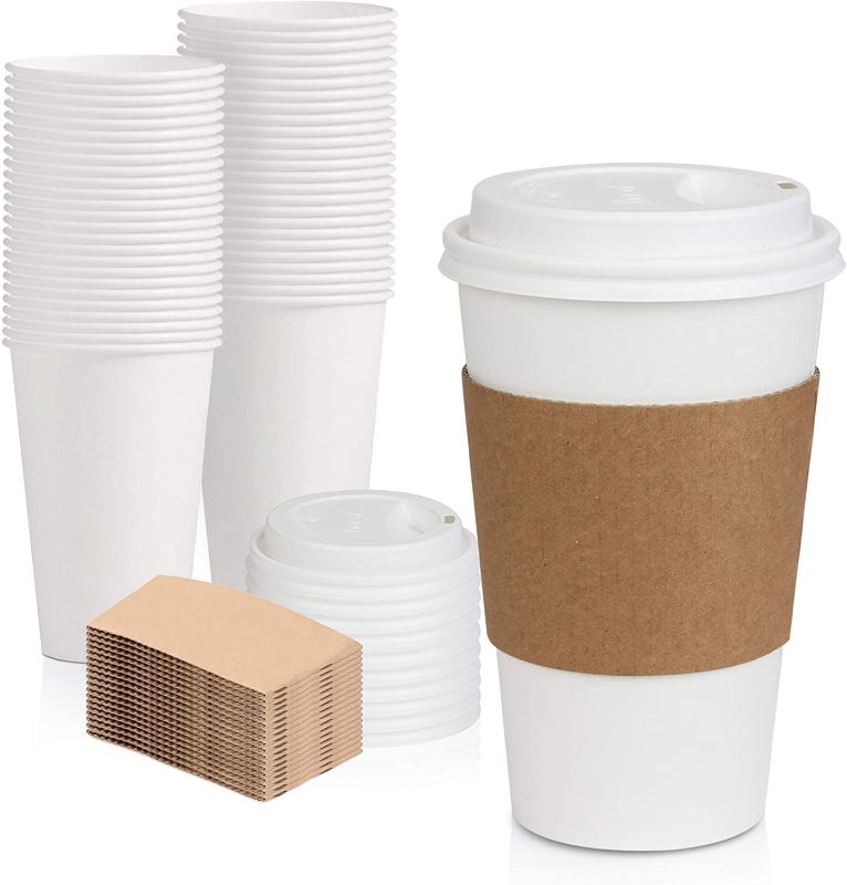 Photo 1 of [50 Pack] White Coffee Cups with White Dome Lids and Brown Sleeves - 16oz Disposable Paper Coffee Cups - To Go Cups for Hot Chocolate, Tea, and Other Drinks - Ideal for Cafes, Bistros, and Businesses
