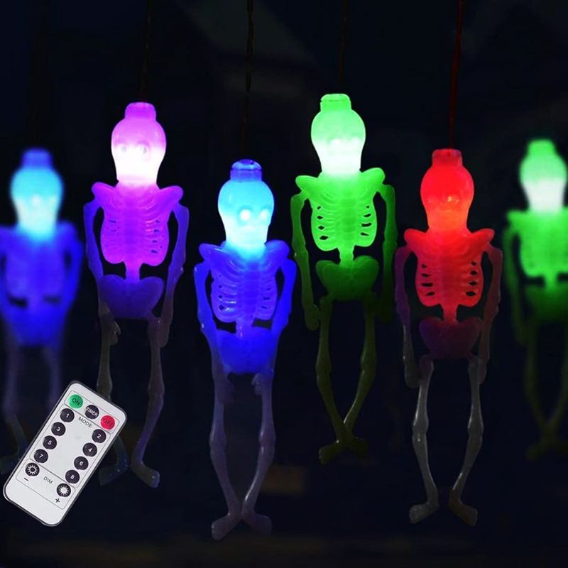 Photo 1 of Halloween Decorations Skeleton Skull String Lights , Halloween Decor 9.8ft 15LED Battery Operated String Lights with 8-Lighting Modes for Indoor, Outdoor, Home, Party, Clearance (1, Multi)
