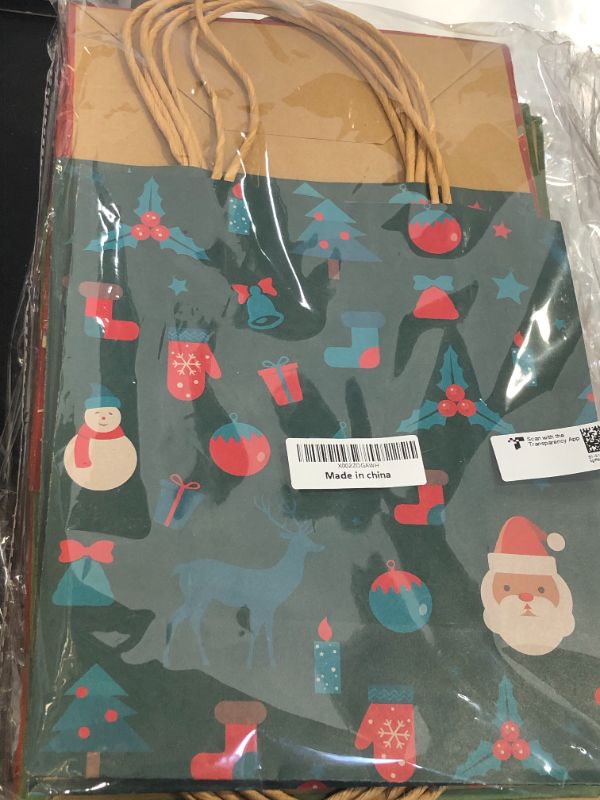 Photo 1 of 12 COUNT CHRISTMAS PAPER GIFT BAGS (UNKNOWN SIZE)