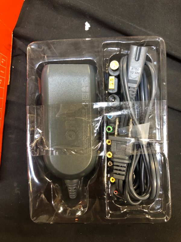 Photo 1 of Onn. 65W Universal Laptop Charger with 10 Interchangable Tips

