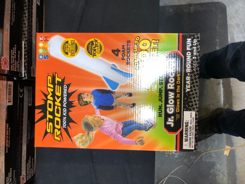 Photo 1 of Stomp Rocket The Original Jr. Glow Rocket Launcher, 4 Foam Rockets and Toy Air Rocket Launcher - Glows in The Dark, STEM Gift for Boys and Girls Ages 3 Years and Up - Great for Year Round Play
