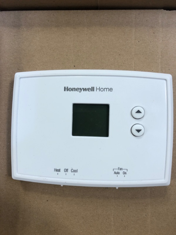 Photo 1 of  Honeywell Electronic Non-Programmable Thermostat