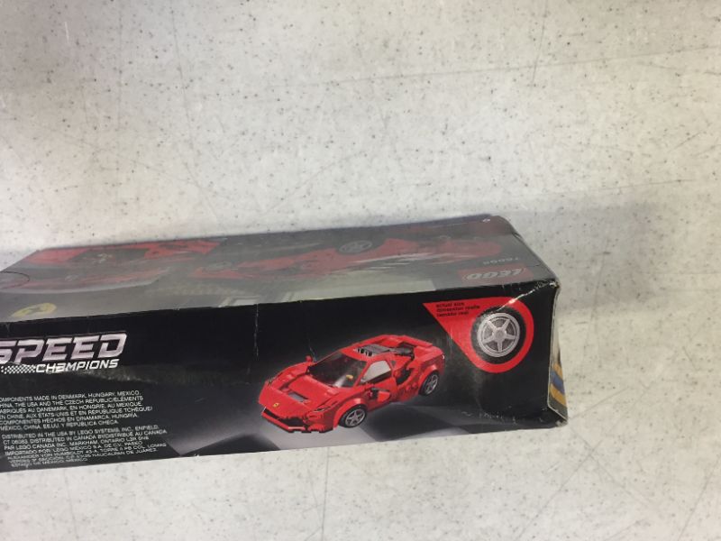 Photo 2 of LEGO Speed Champions 76895 Ferrari F8 Tributo Toy Cars for Kids, Building Kit Featuring Minifigure (275 Pieces, box is damaged, still factory sealed)