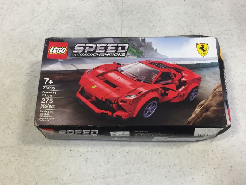 Photo 3 of LEGO Speed Champions 76895 Ferrari F8 Tributo Toy Cars for Kids, Building Kit Featuring Minifigure (275 Pieces, box is damaged, still factory sealed)