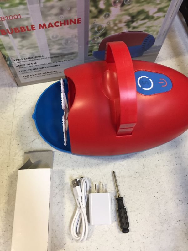 Photo 1 of Kiticute Automatic Bubble Machine for Kids, Portable Bubble Blower with 2 Speed ??Levels, Bubble Machine Over 5000 Bubbles Per Minute with Detachable Water Tank, Powered by Plug or Batteries