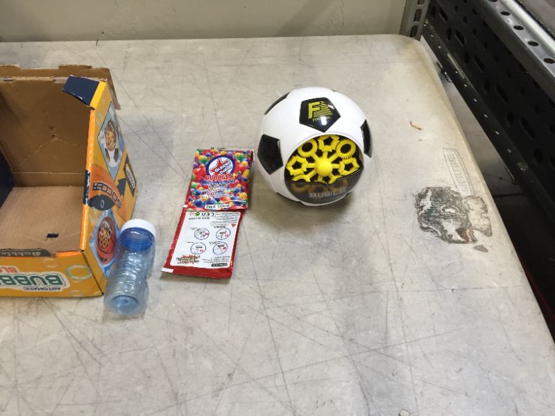 Photo 1 of generic soccer bubble toy with 3 bubble liquid packets 