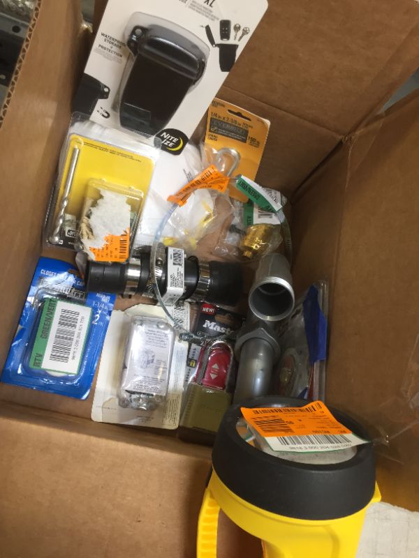 Photo 1 of bag lot misc items sold as is home depot used and missing pieces items masks / light / pipes / locks etc..