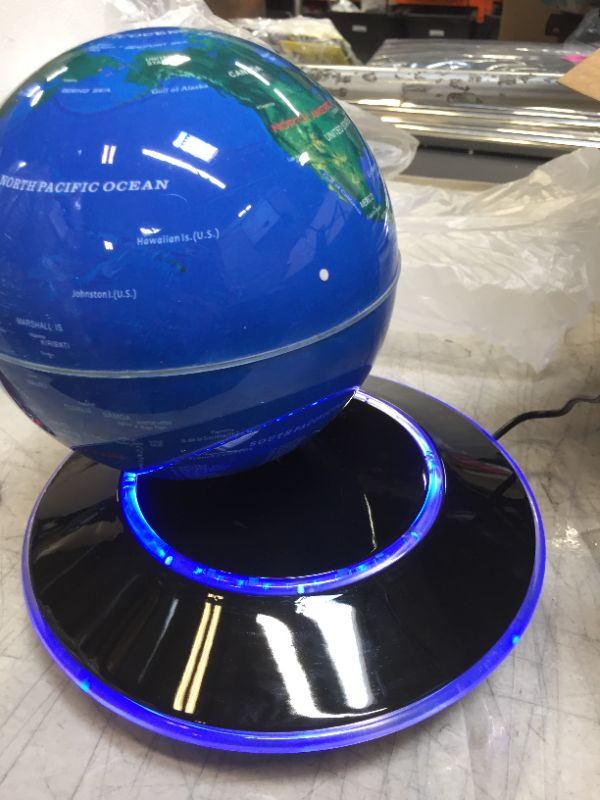 Photo 2 of Floating Globe 6" Magnetic Levitation Floating Globe Anti Gravity Rotating World Map LED Blue Globe for Children Educational Gift Home Office Desk Decoration (A)
