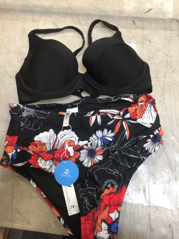 Photo 1 of WOMENS BATHING SUIT SIZE MEDIUM BLACK AND FLORAL PRINT 