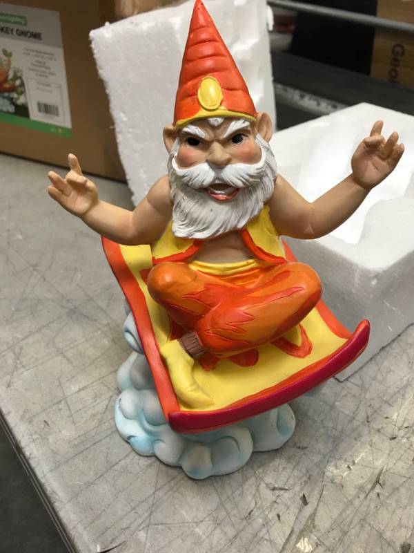 Photo 2 of GreenLighting Hide Your Key Genie on a Magic Carpet Garden Gnome Outdoor Figurine - Hand Painted Funny Novelty Lawn Statue for Front Yards and Flowerb 2 PK 
