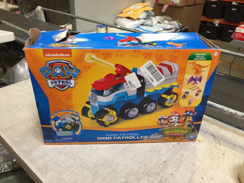 Photo 1 of Paw Patrol, Dino Patroller Motorized Vehicle with 3 Exclusive Bonus Action Figures and 2 Dinosaur Toys (Amazon Exclusive), Kids Toys for Ages 3 and up
