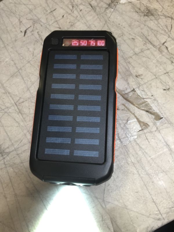Photo 3 of fast charging dual usb led solar power bank portable charger---one works other does not turn on lights 