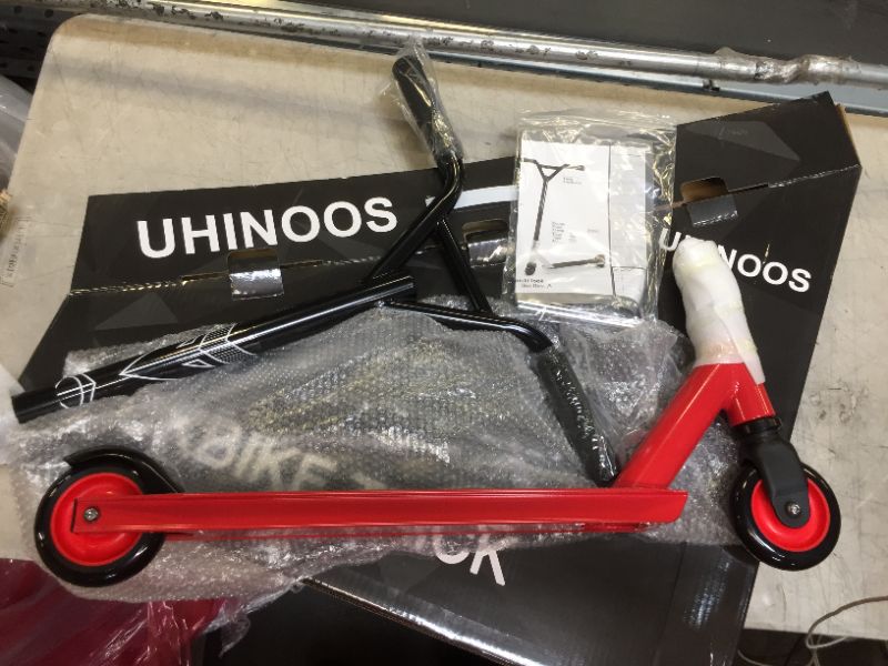 Photo 3 of UHINOOS Pro Stunt Scooter, Aluminum Trick Scooter Freestyle Kick Scooter for Teenagers color red and black 
