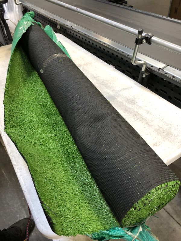 Photo 1 of 4FT WIDE ROLL OF FAKE GRASS 
UNKNOWN LENGTH 