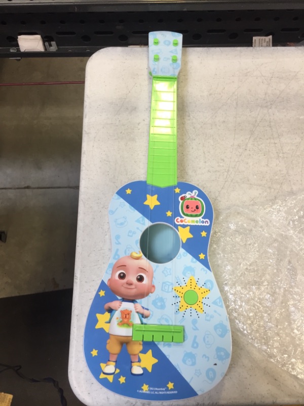 Photo 2 of CoComelon Musical Guitar by First Act, 23.5” Kids Guitar - Plays Clips of The ‘Finger Family’ Song - Musical Instruments for Kids, Toddlers, and Preschoolers
