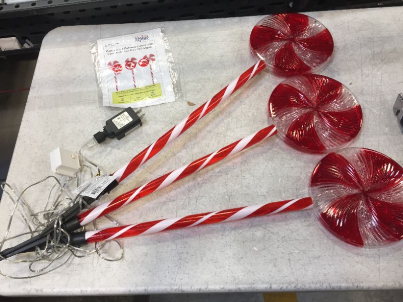 Photo 2 of Alpine Corporation COR114T-3 Candy Cane Pathway LED, Decorative Winter Christmas Lights for Front Yard, Red and White, Set of 3 Holiday décor
