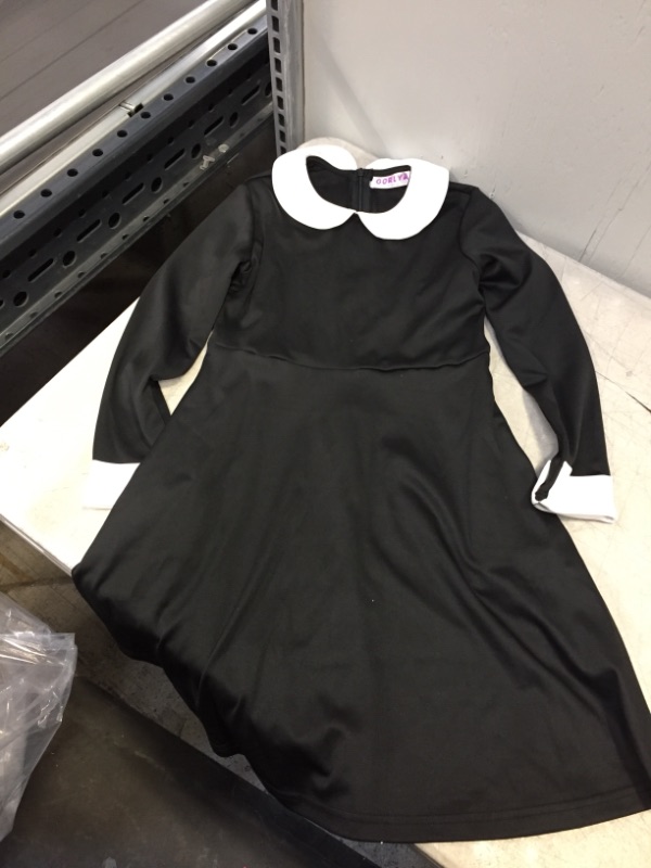 Photo 1 of GORLYA GIRLS LOONG SLEEVE DRESS BLACK/WHITE
SIZE 8 YEAR OLD