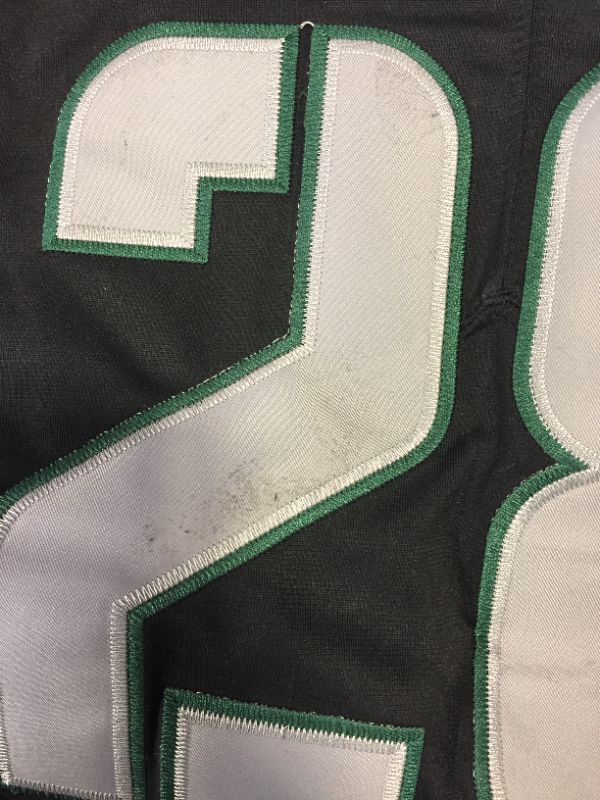 Photo 4 of GENERIC FOOTBALL JERSEY BLACK AND GREEN (DILLON NUMBER 28) MARKED AS SIZE LARGE -- SLIGHT DAMAGE TO NUMBER IN BACK 