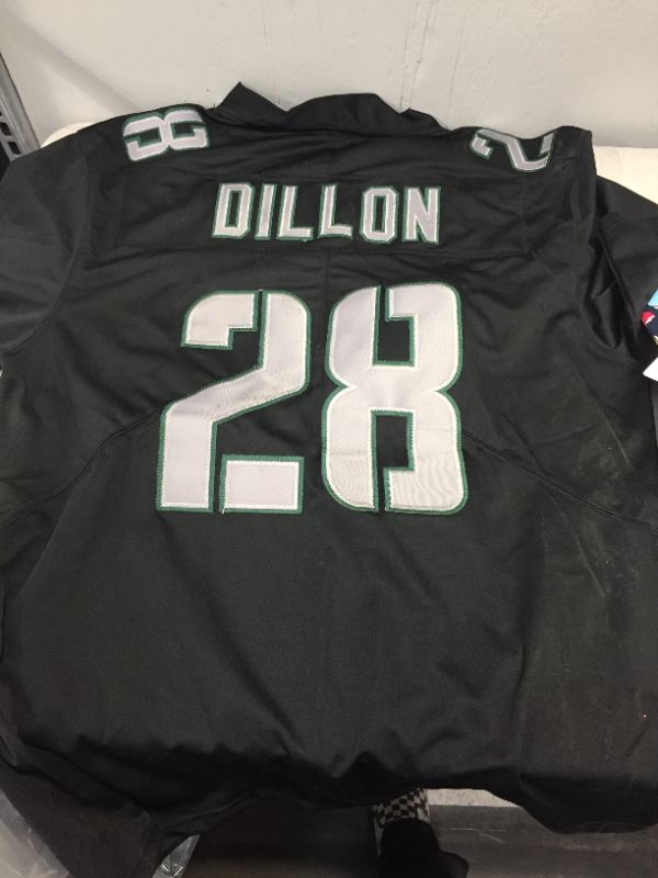 Photo 1 of GENERIC FOOTBALL JERSEY BLACK AND GREEN (DILLON NUMBER 28) MARKED AS SIZE LARGE -- SLIGHT DAMAGE TO NUMBER IN BACK 