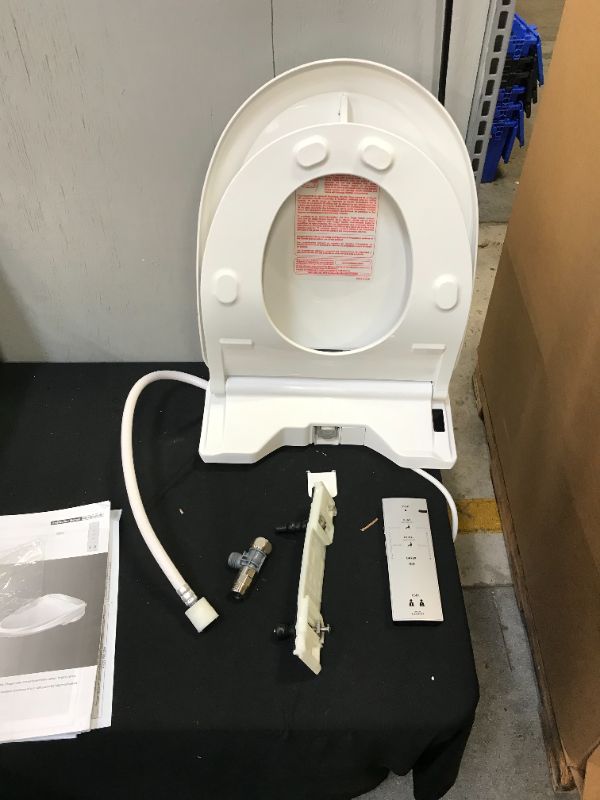 Photo 4 of Toto WASHLET S350e Electronic Bidet Toilet Seat with Auto Open and Close and EWATER+ Cleansing, Round, Cotton White (SW58301) (used, possibly missing parts)