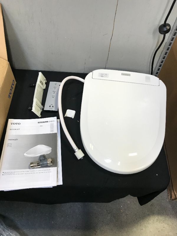 Photo 3 of Toto WASHLET S350e Electronic Bidet Toilet Seat with Auto Open and Close and EWATER+ Cleansing, Round, Cotton White (SW58301) (used, possibly missing parts)