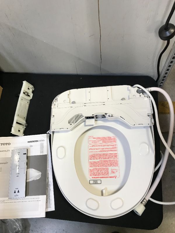 Photo 5 of Toto WASHLET S350e Electronic Bidet Toilet Seat with Auto Open and Close and EWATER+ Cleansing, Round, Cotton White (SW58301) (used, possibly missing parts)