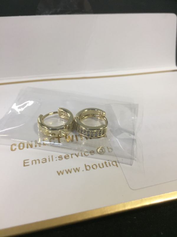 Photo 2 of Small Gold Huggie Hoop Earrings for Women | 14K Real Gold Plated CZ Cartilage Cuff Earrings for Girls *** EARRINGS ARE GOLD, COLOR IS DULLED IN LIVE PHOTO FROM CAMERA QUALITY ***
