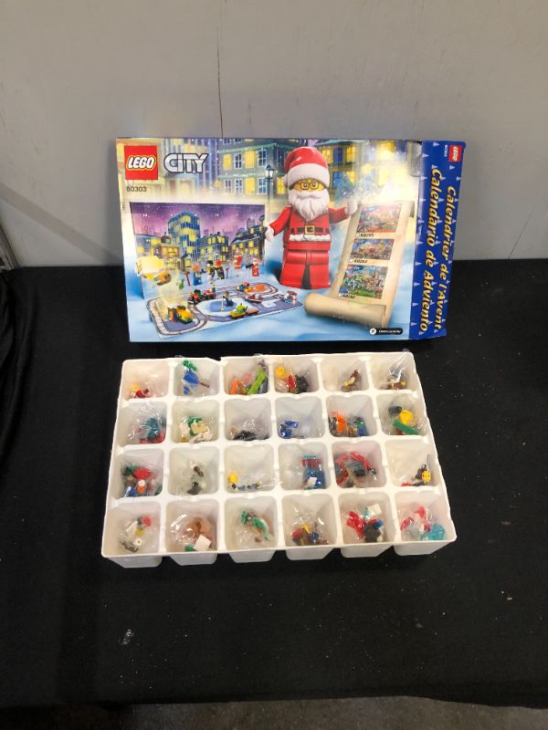 Photo 1 of LEGO City Advent Calendar 60303 Building Kit; Includes City Play Mat; Best Christmas Toys for Kids; New 2021 (349 Pieces)