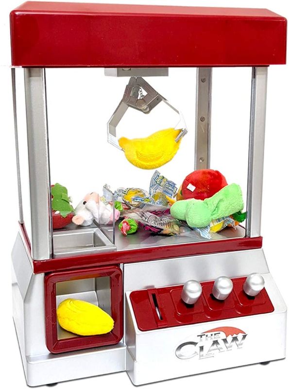 Photo 1 of Electronic Arcade Claw Machine Mini Candy Prize Dispenser Game With Sound (unable to test batteries not included) 