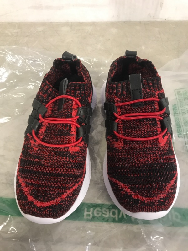 Photo 1 of CHILDREN'S SLIP ON TENNIS SHOE, SIZE 12 