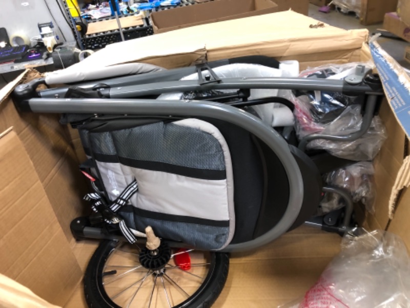 Photo 2 of Graco FastAction Fold Jogger Travel System | Includes the FastAction Fold Jogging Stroller and SnugRide 35 Infant Car Seat, Gotham
