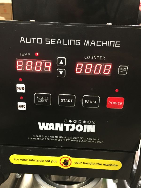Photo 2 of Automatic sealer machine