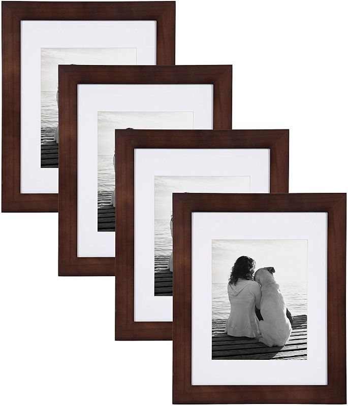 Photo 1 of DesignOvation Museum Wooden Traditional Picture Frame Set with Mats for Customizable Wall Display, 11x14 matted to 8x10, Walnut Brown, 4 Pack
