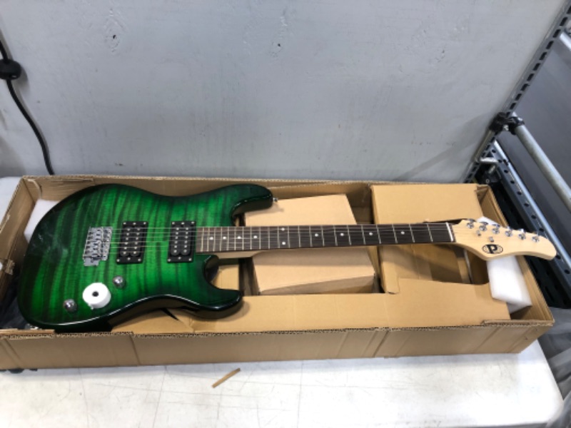 Photo 2 of Pyle Electric Guitar and Amp Kit - Full Size Instrument w/Humbucker Pickups Bundle Beginner Starter Package Includes Amplifier, Case, Strap, Tuner, Pick, Strings, Cable, Tremolo (Green)
