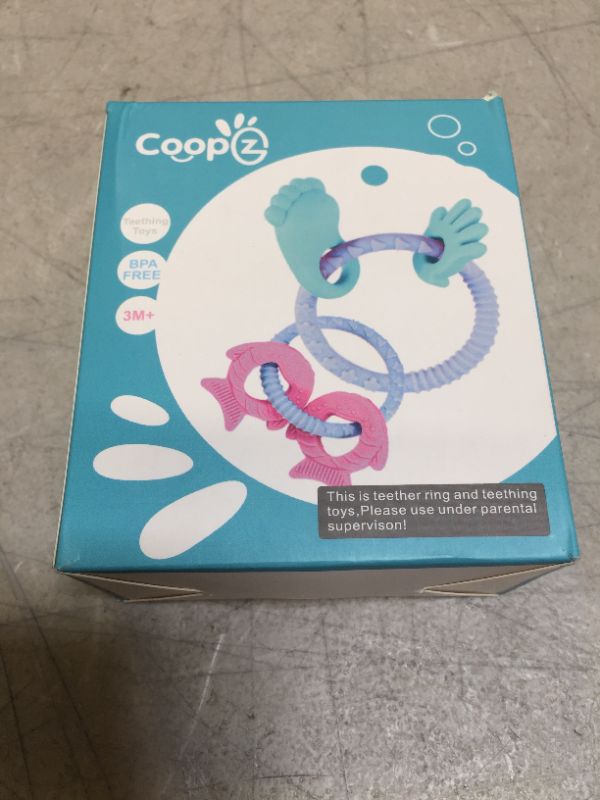 Photo 2 of Coopzero Baby Teether Rattles (2 Pack),Teething Toys,Baby Teething Chew Toys,The Surface Raised Textures Perfect for Soothing Gums for Ages 3 Months and Up,Easily Hold,BPA Free
