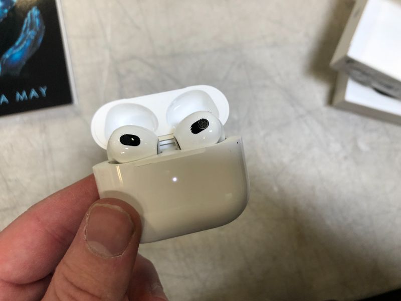 Photo 4 of Apple AirPods (3rd Generation) SN: R7CTXRXXNC
