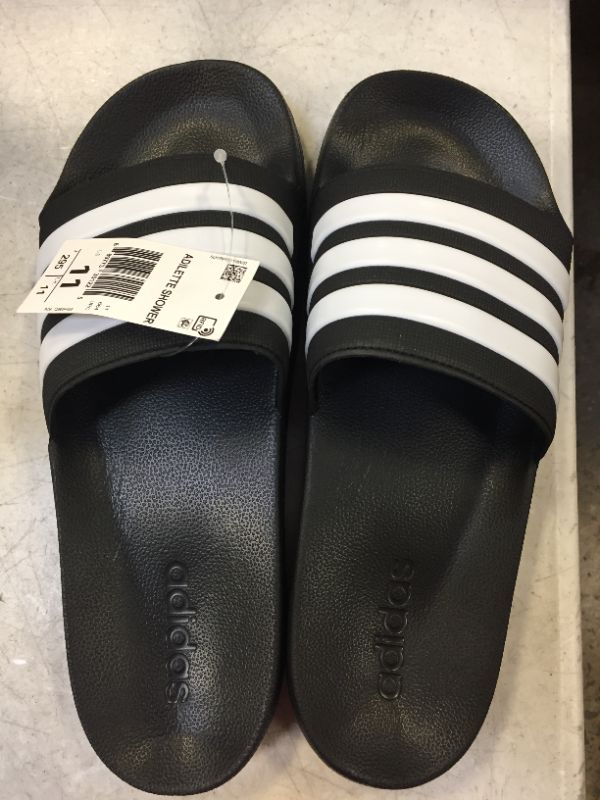 Photo 4 of adidas Men's Adilette Shower Slide ( pair come together one is  size 11 / 2nd  size 12)
