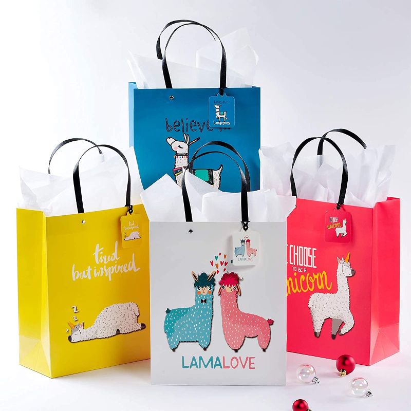 Photo 1 of 4 Pack Gift Bags for Party Celebration, Christmas Gift Wrapping Bags with Cute Animals, Medium Size Gift Bags with Tissue, Gift Wrap Bags with Handles, Unicorn Gift Bags for Girls and Boys.
