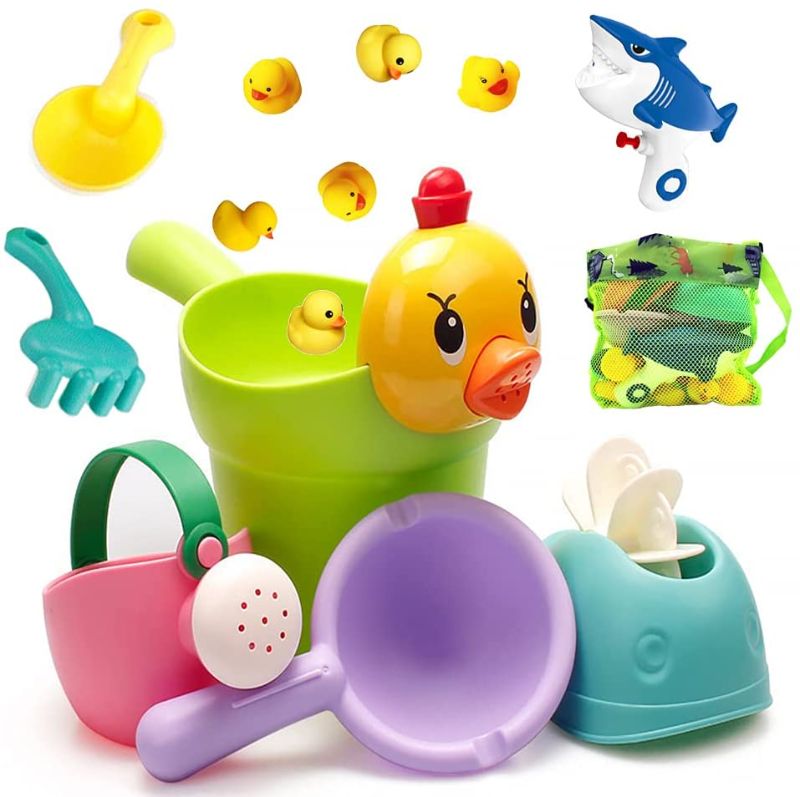 Photo 1 of iSophiNet Children's Beach Toy Set Soft Rubber Beach Bucket Toys Including Blue Shark Spray Gun, Whale Waterwheel, Small Yellow Duck Drinking Bottle, Beach Spoon, Shovel, Watering Can with Net Bag
