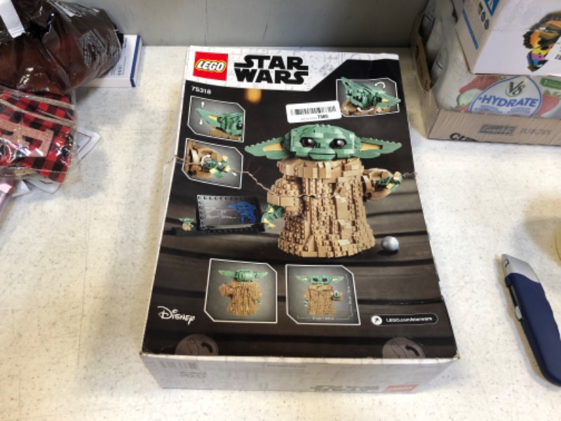 Photo 3 of LEGO Star Wars: The Mandalorian The Child 75318 Building Kit; Collectible Buildable Toy Model for Ages 10+, New 2020 (1,073 Pieces)
