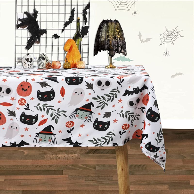 Photo 1 of FestiCorp Halloween Tablecloth Rectangle 39x59 Inches Long - Stain and Wrinkle Resistant Washable Autumn/Fall Square Table Cover for Kids, Spooky Decorative Table Clothes for Rectangle Table, White
