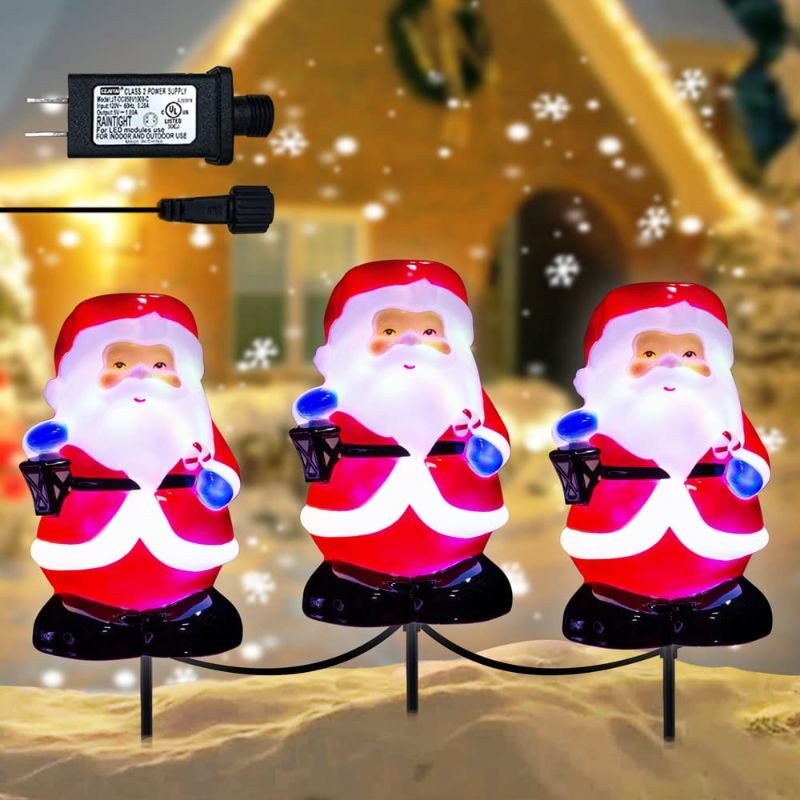 Photo 1 of Christmas Pathway Light Outdoor Decorations Garden Stakes, Waterproof Bright Colour Rotating LED Santa Claus Landscape Pathway Light Decor, Cute Xmas Outside Light Stakes for Patio, Yard, Garden, Lawn
