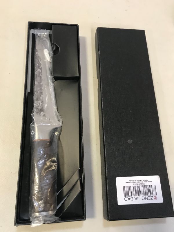 Photo 2 of Bolster Boning Knife Fillet Knife with Sheath 7 inch Forged HC Steel Blade for Beaf and Turkey Deboning Filleting, and Trimming with Gift Box Meat Cleaver For Kitchen Outdoor BBQ Camping,ZENG JIA DAO
MISSING LEATHER CASE, DAMAGES TO PACKAGING 