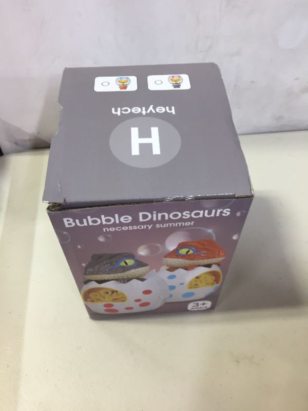 Photo 2 of heytech Bubble Machine Dinosaur Bubble Bubble Machine for Kids Toddlers Boys Girls Baby Bath Toys Indoor Outdoor Automatic Bubble Maker (Brown)
