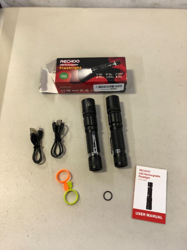 Photo 2 of 2 Pack USB Rechargeable Flashlight - Small & Bright LED Mini Flashlights, High Lumens, 4 Modes, Zoomable, The Size of Pocket Gifts for Kids (MISSING ONE RUBBERBAND)
