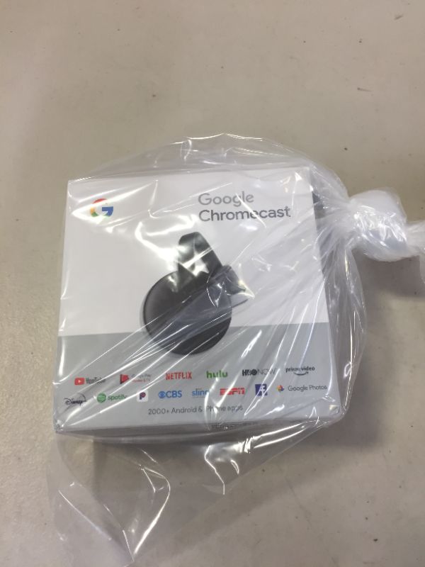 Photo 1 of Google Chromecast - Streaming Device with HDMI Cable - Stream Shows, Music, Photos, and Sports from Your Phone to Your TV
