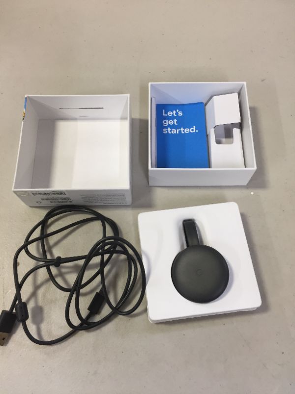 Photo 2 of Google Chromecast - Streaming Device with HDMI Cable - Stream Shows, Music, Photos, and Sports from Your Phone to Your TV
