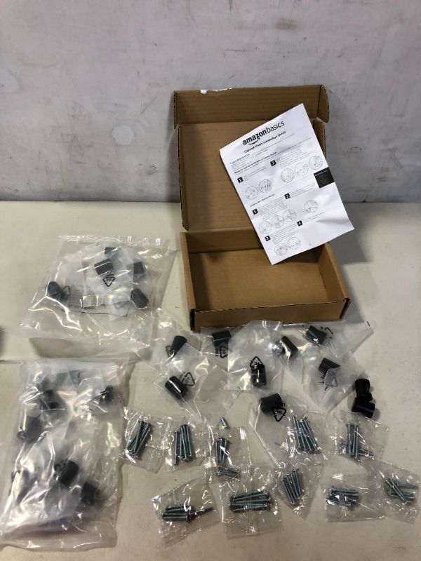 Photo 1 of Amazon Basics Whistle Cabinet Knob, 0.75-inch Diameter, Flat Black, 25-Pack (POSSIBLY MISSING PIECES AND HARDWARE)